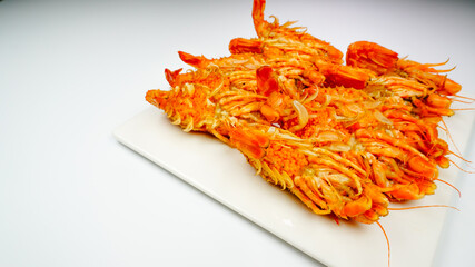 Bear Shrimps (Sclerocrangon salebrosa, Wild Russian Shrimp) on a white plate