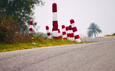concrete pillars beside streets