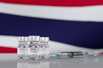 3D rendering a Concept of coronavirus vaccine made in Thailand with vaccine vial and syringe with Thai flag background.