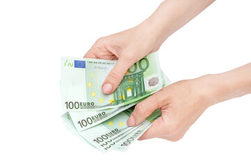 Woman's hands holding one hundred euro banknotes. Isolated on white.