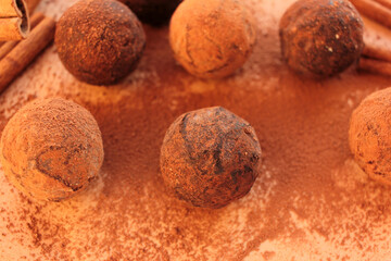 Chocolate truffles on a craft paper background. View from overhead