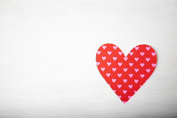 Fototapeta premium Red heart with copy space on white wooden background