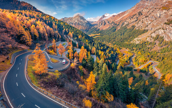 Aerial landscape photography. Colorful autumn scene of Maloja pass, Switzerland, Europe. Picturesque morning view from flying drone of Swass Alps. Traveling concept background.. © Andrew Mayovskyy