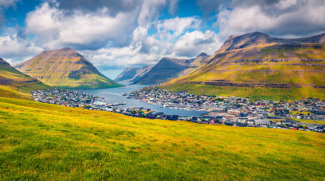 Landscape photography. Impressive morning view of Klaksvik town. Stunning summer scene of  Faroe Islands, Denmark, Europe. Traveling concept background.