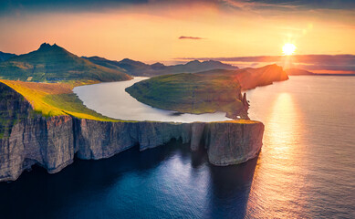 Magnificent evening view from flying drone of Sorvagsvatn lake, Vagar, Faroe Islands, Denmark,...