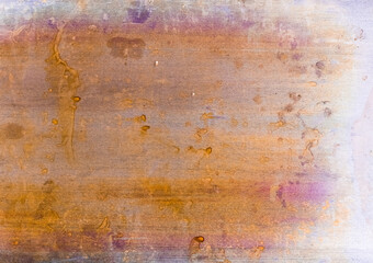 Colorful abstract background. Rusty aged texture. Yellow purple distressed surface with grainy splotches dirt dust scratches. Dry acrylic paint drip creative design.