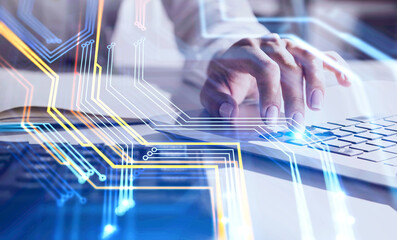 Woman typing on laptop and circuit interface