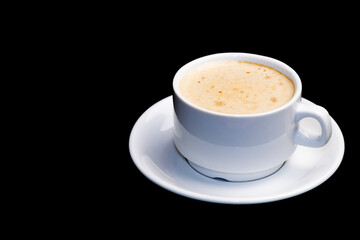 cup of cappuccino on a black background. isolate