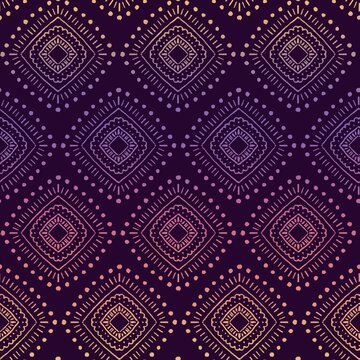 Seamless ethnic geometric pattern purple pink yellow. Repeating geometric background aztec boho tribal style. Rhombus shapes. Use for fabric, wallpaper, home decor.