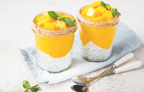 Vegetarian chia pudding with mango in a jar, selective