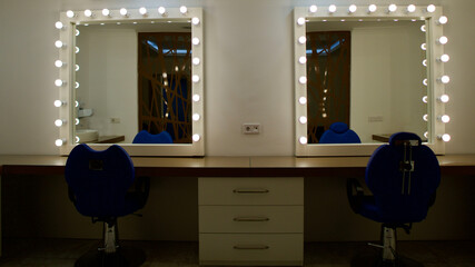 Illuminated makeup room. Empty actor preparation room.