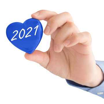 Male hand and blue heart 2021 isolated against white background