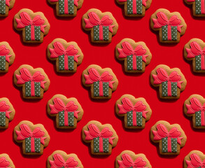 Gift box pattern. Women Day. Red seamless background. Holiday surprise. Creative beige green gingerbread present design cookie minimalist symmetrical composition isolated on bright.