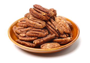 Peeled pecan nuts closeup, isolated on white background