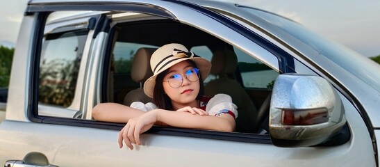 woman in car on the afternoon of weekend