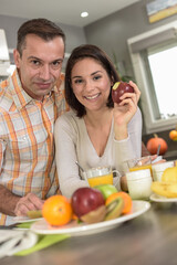 Middle age couple enjoys their healthy breakfast