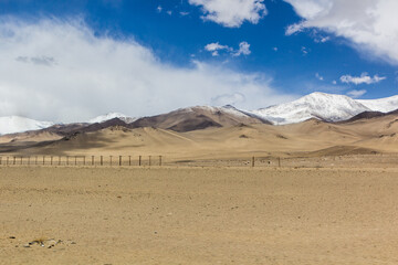 Fototapeta na wymiar Chinese border fence in Gorno-Badakhshan Autonomous Region, Tajikistan