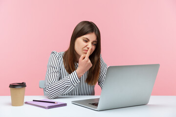 Don't lie! Bossy annoyed business woman touching nose, doing liar gesture, looking with suspicion...