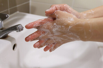 Fototapeta premium Washing hands rubbing with soap for corona virus prevention. Health care