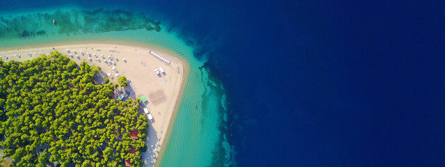 Aerial drone ultra wide photo from paradise organised bay and sandy beach of Gregolimano, North...