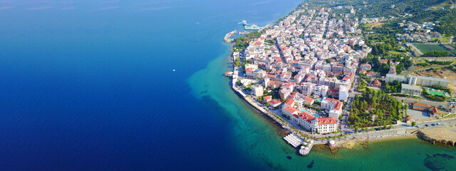 Aerial drone ultra wide photo of famous seaside village well known for thermal springs of Aidipsos, North Evia island, Greece