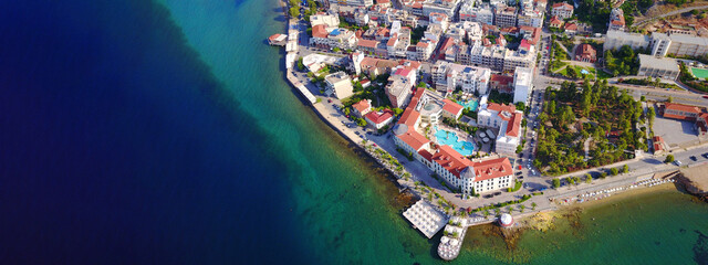 Aerial drone ultra wide photo of famous seaside village well known for thermal springs of Aidipsos,...