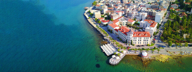 Aerial drone ultra wide photo of famous seaside village well known for thermal springs of Aidipsos, North Evia island, Greece