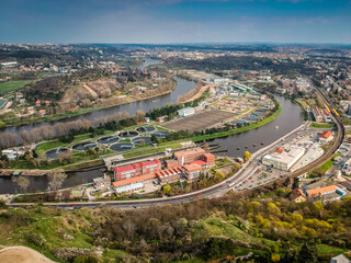 Aerial view of sewage disposal plant in Podbaba, Dejvice in Prague 6 by the river Moldau  - obrazy, fototapety, plakaty