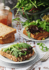 Sandwiches with salmon, avocado and salad