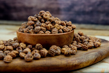 Tiger nuts in a wooden bowl