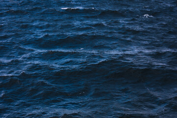 Fototapeta premium dark surface of waves on the sea