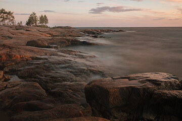 Rocky Shore line in Faboda, Finland on sunset