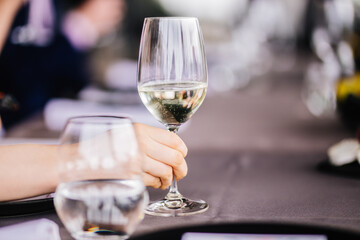 Person Holding glass of champagne