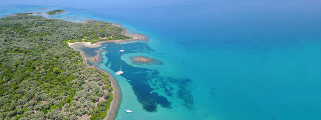 Aerial drone ultra wide panoramic photo of exotic paradise island complex forming an atoll archipelago 