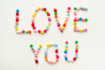 St. Valentines day theme, read heart made from play dough full of numbers, letters and symbols. fine motoric skills, early education. idea for mothers to exercise child brain activity at home