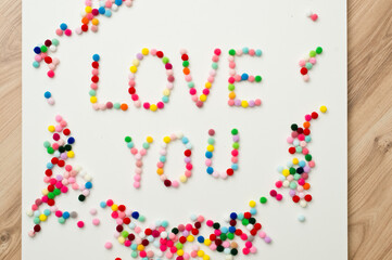 St. Valentines day theme, read heart made from play dough full of numbers, letters and symbols. fine motoric skills, early education. idea for mothers to exercise child brain activity at home