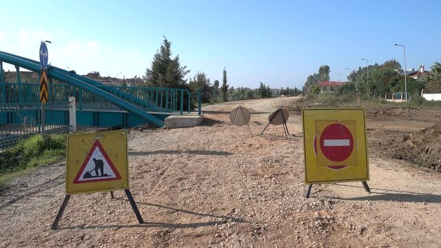 Fethiye, Turkey - 27th of December 2020: 4K Road works and no entry signs on the digged vicinal road
