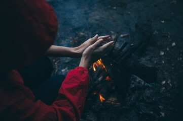 campfire winter night in the forest, fire baking and warm cozy concept