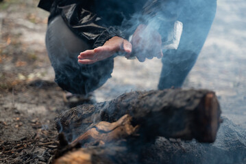 campfire winter night in the forest, fire baking and warm cozy concept