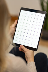 Businesswoman holding digital tablet in woman hands, browsing internet or application with blank...