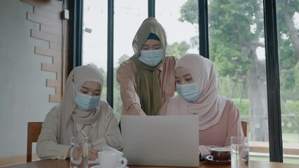 business meeting of Islamists wearing a mask against the epidemic COVID-19 applauding their congratulations after a supervisor announced the success of the event.
- Powered by Adobe