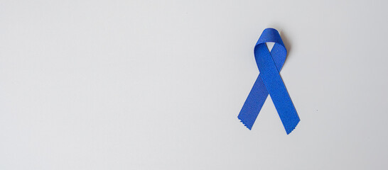 March Colorectal Cancer Awareness month, dark Blue color Ribbon for supporting people living and...