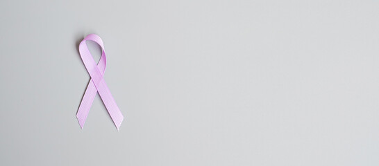 World cancer day (February 4). Lavender purple ribbon for supporting people living and illness....