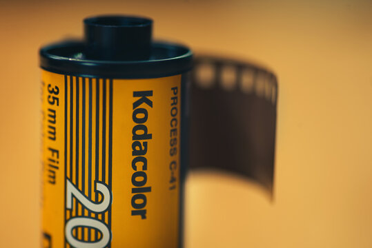 Kodak Kodacolor 35mm camera film on a wooden background