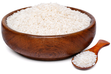 Parboiled rise in a wooden bowl with a spoon