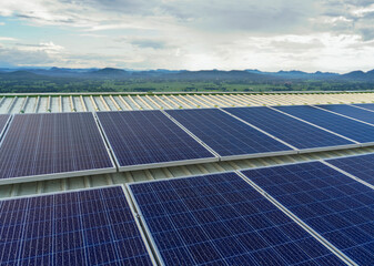 solar cells panel installed on the roof of a large building are full of dirt and dust.