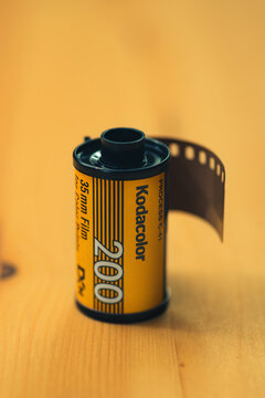 Kodak Kodacolor 35mm camera film on a wooden background