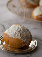 Maritozzi with cream and powder sugar