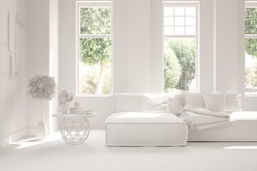 White living room with sofa and summer landscape in window. Scandinavian interior design. 3D illustration