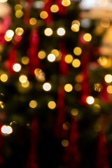 Golden glowing bokeh background. Abstract bright led light backgdrop. Defocused image